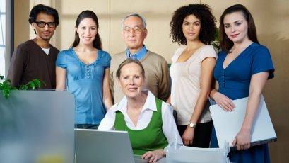 Portrait of group of people in office